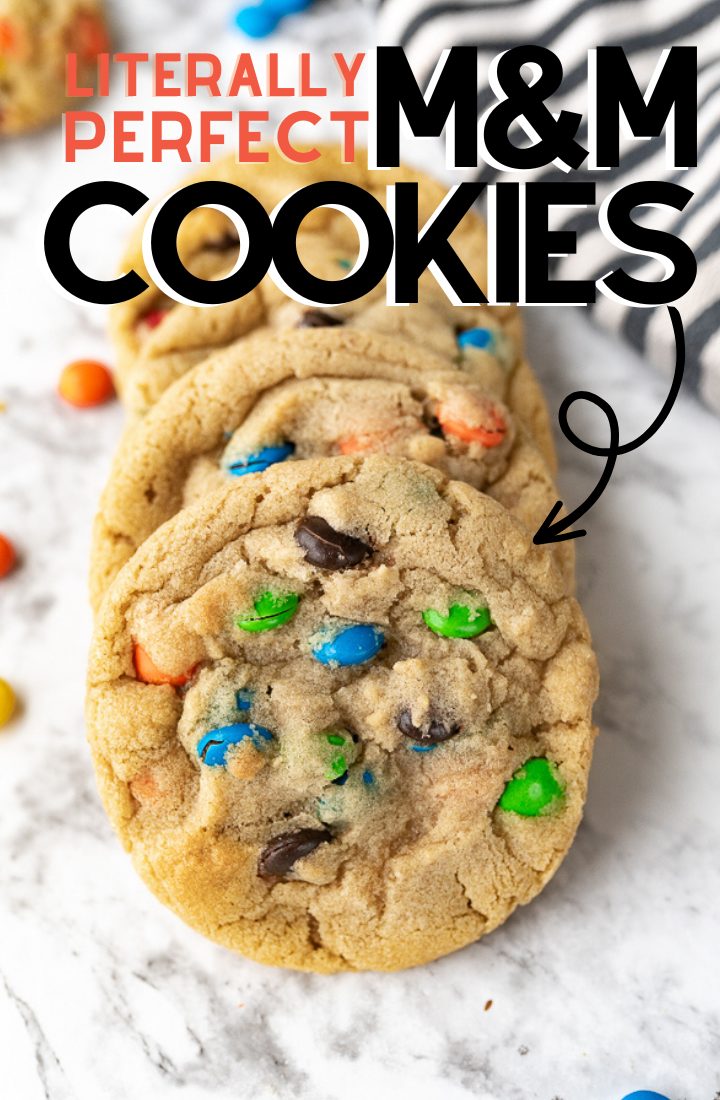 M&M cookies on the counter with text on the photo that reads "literally perfect m&m cookies."