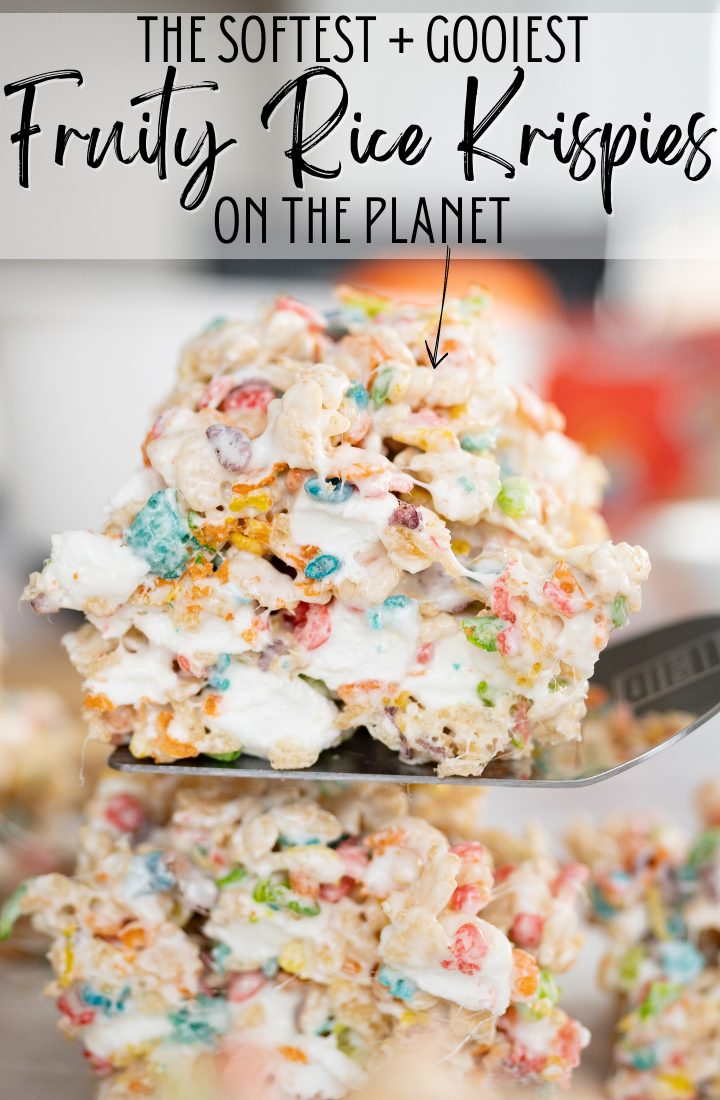 A spatula holding up a fruity pebble treat with text on the photo that reads "the softest + gooiest fruity rice krispies on the planet."