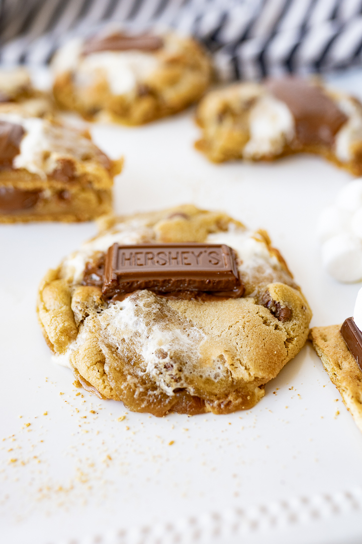 Up close photo of a smores cookie with several more cookies in the background.