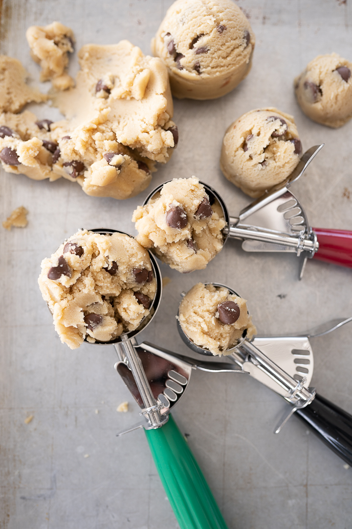 cookie scoops with cookie dough inside. 