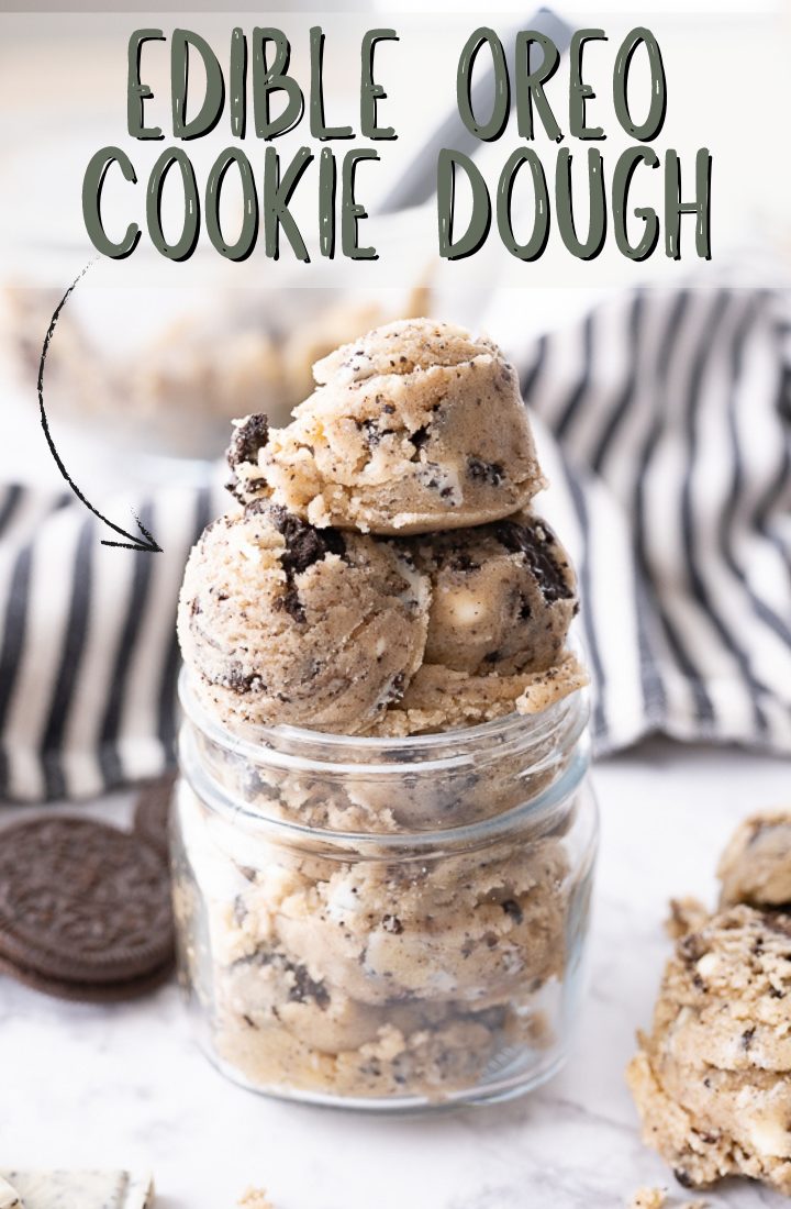 Oreo cookie dough in a glass jar on the counter with text on the photo that reads "edible oreo cookie dough."