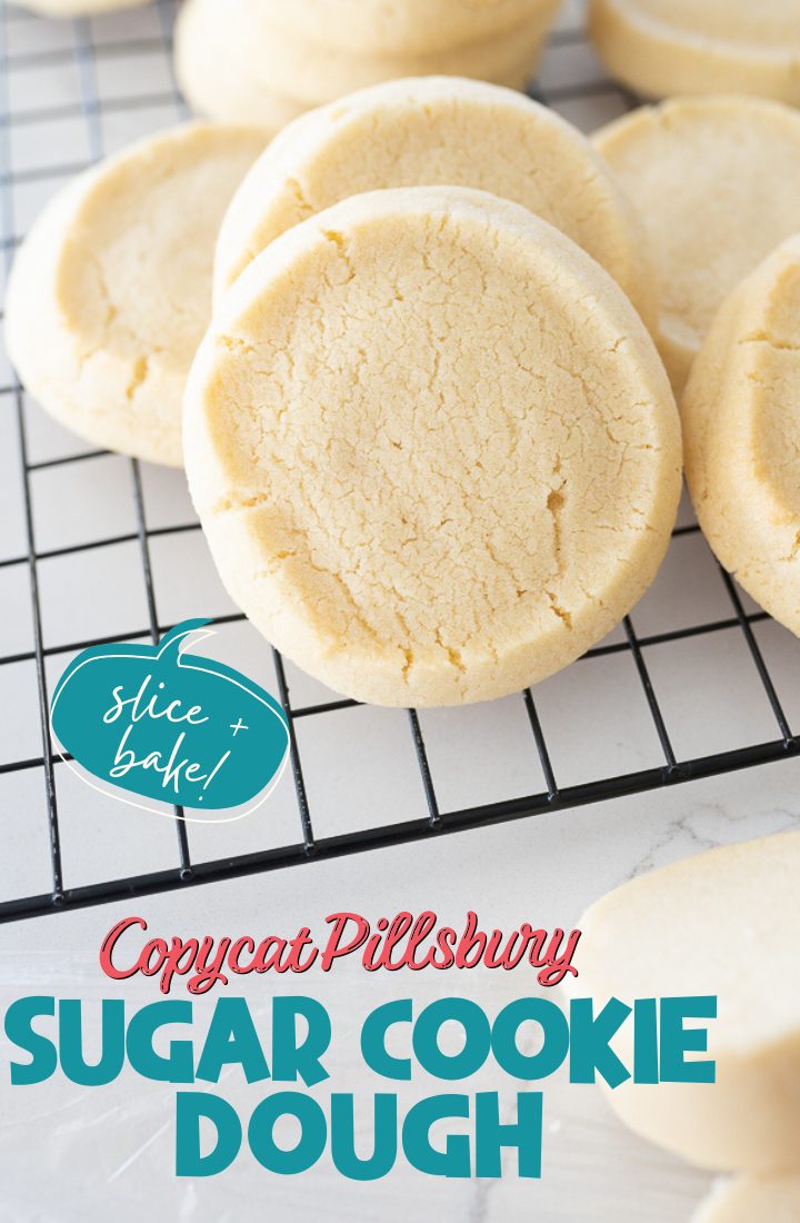 Picture of cooked Pillsbury Sugar Cookies piled on a wire cooling rack. Across the bottom it says "Copycat Pillsbury Sugar Cookie Dough" in text. 