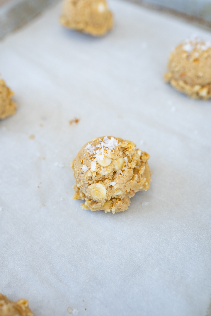 salted caramel cookies in a ball before going into the oven to bake. 