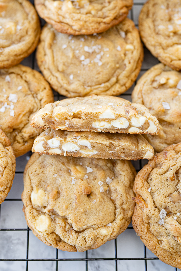 soft and chewy salted caramel cookie cut in half.