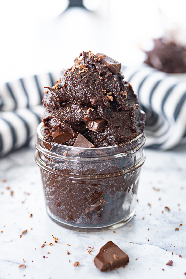 Edible brownie batter with heat-treat flour in a glass jar. 