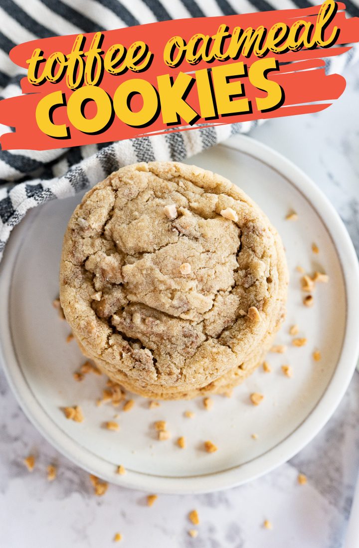 A stack of toffee cookies on a white plate. There are cookie crumbs around the bottom of the pile. Across the top it says "Toffee Oatmeal Cookies" in text.
