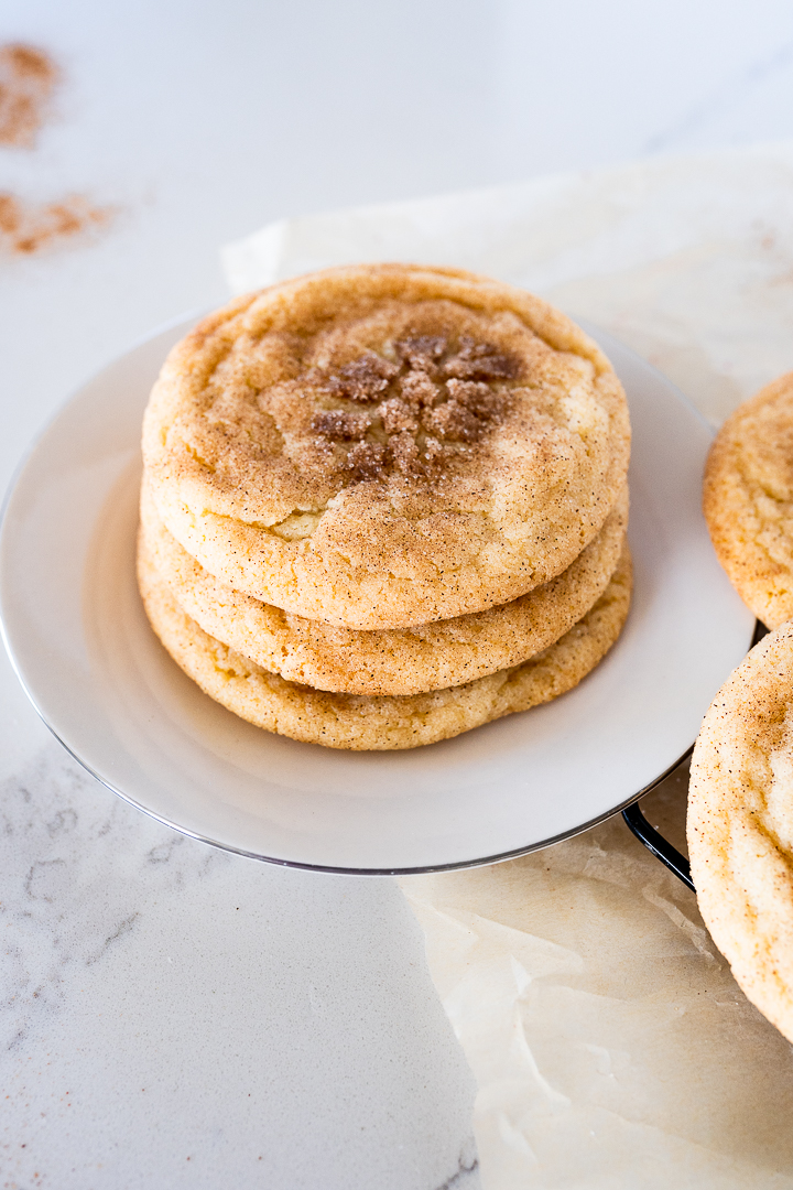 Stack of the best snickerdoodle cookies sitting on a plate. 