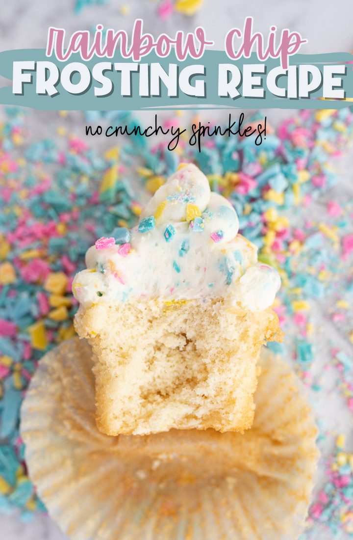 Aerial view of a cupcake that has been sliced in half laying face up on the counter top. The cupcake is topped with rainbow chip frosting and surrounded by sprinkles. On top it says "rainbow chip frosting recipe"