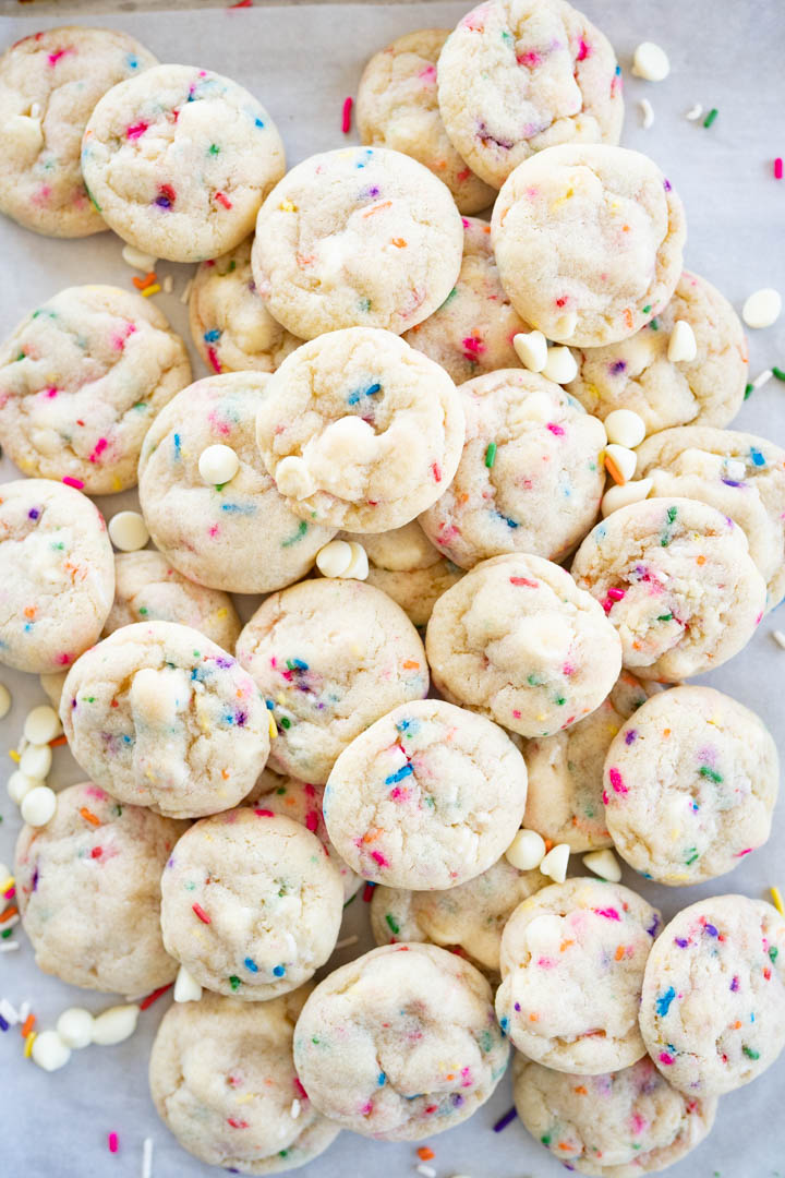 A giant pile of copycat costco sprinkle cookies on the counter. 