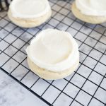 Aerial view of crumbl vanilla sugar cookie on cooling rack.