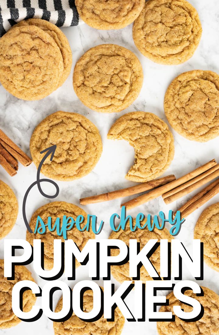An aerial view of pumpkin cookies spread out on the counter with cinnamon sticks. One cookie has a bite out of it. Across the bottom it says "super chewy pumpkin cookies" in text.
