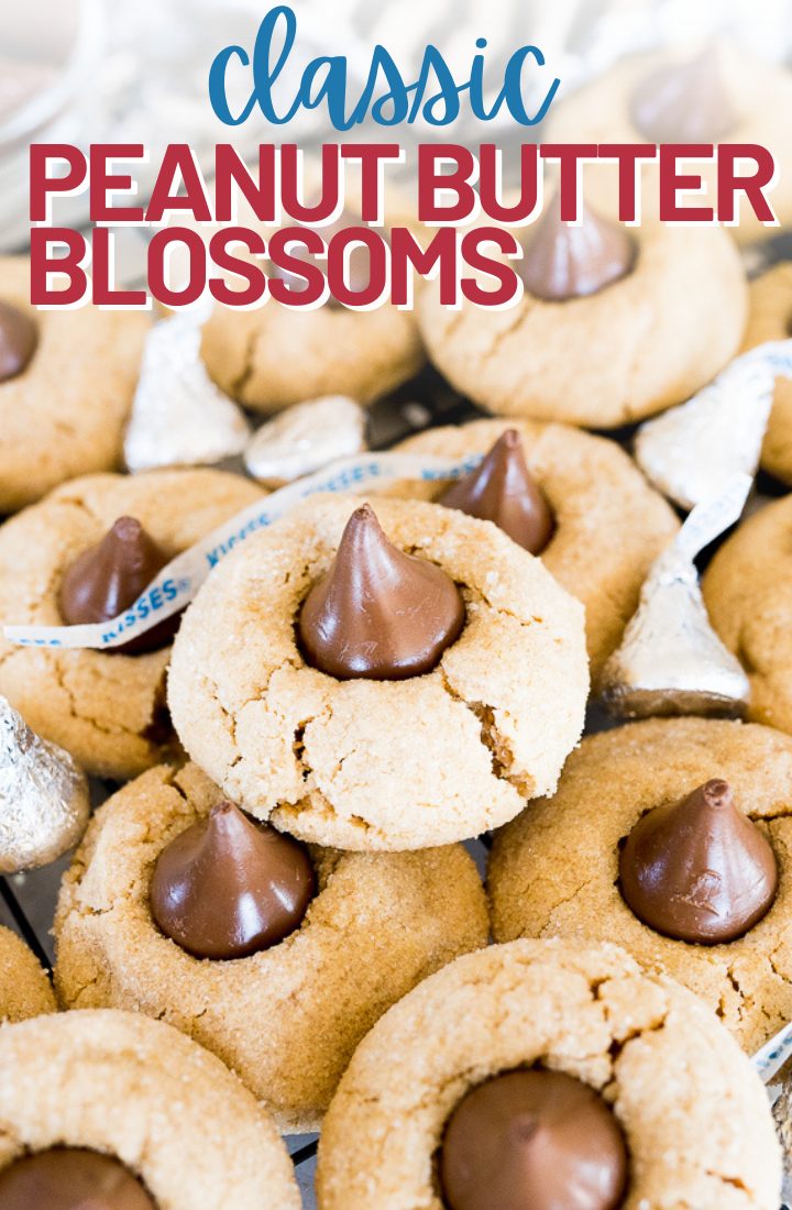 A pile of peanut butter hershey kiss cookies. Across the top it says "classic peanut butter blossoms" in text.