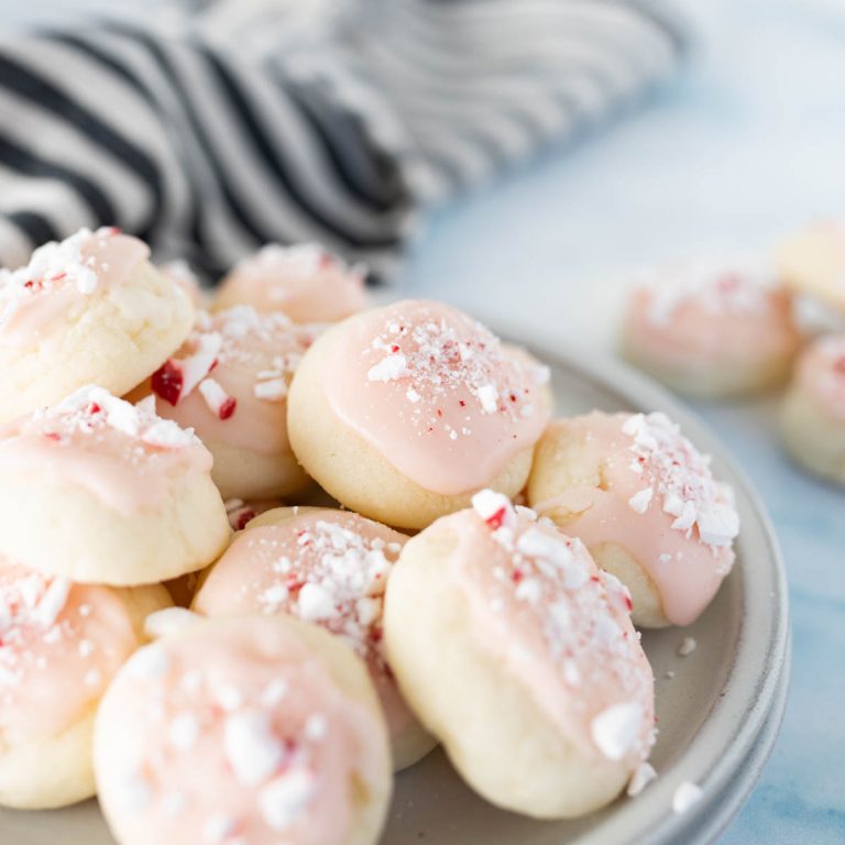 A bowl filled with peppermint meltaway cookies.