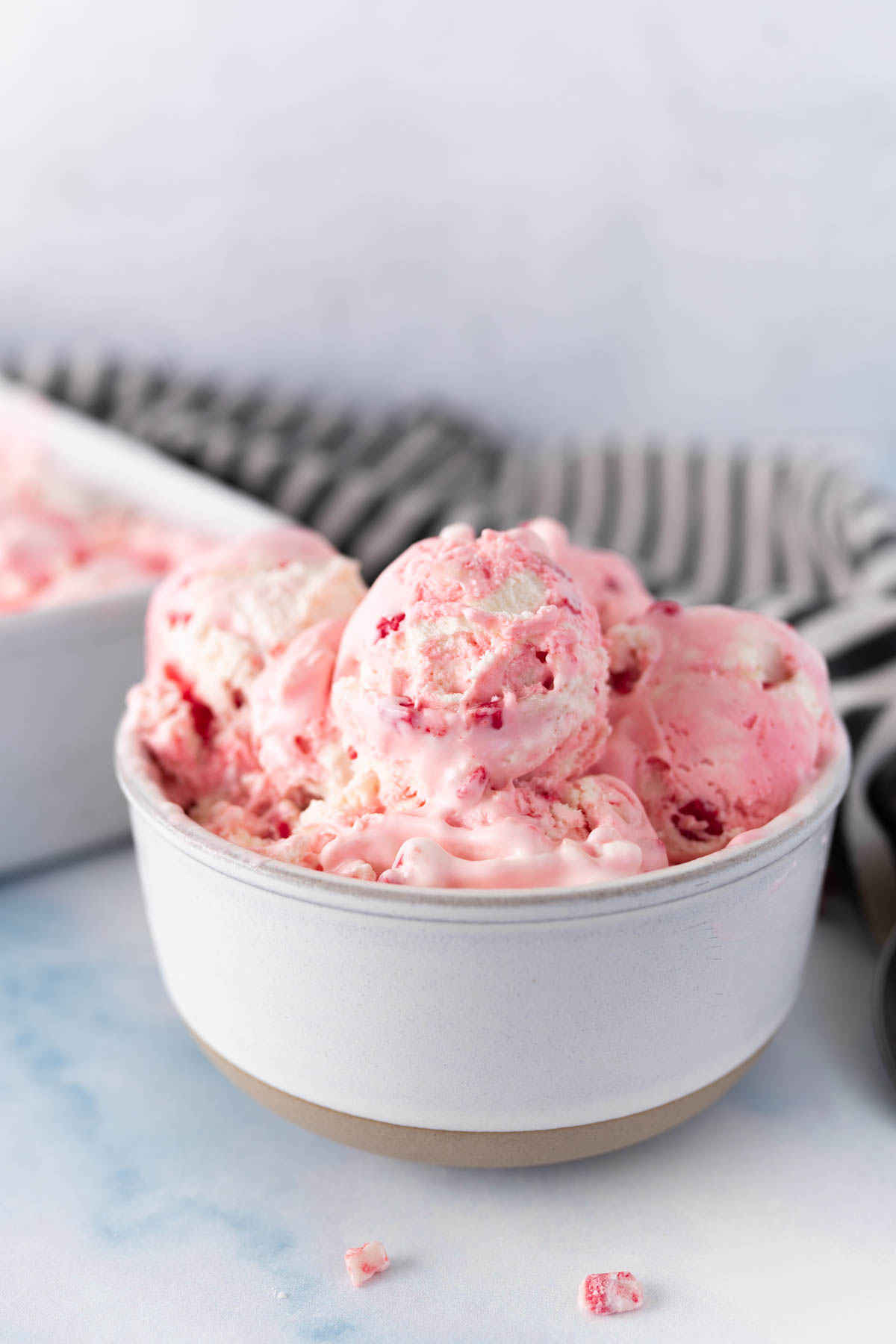peppermint ice cream scooped and served in a bowl. 