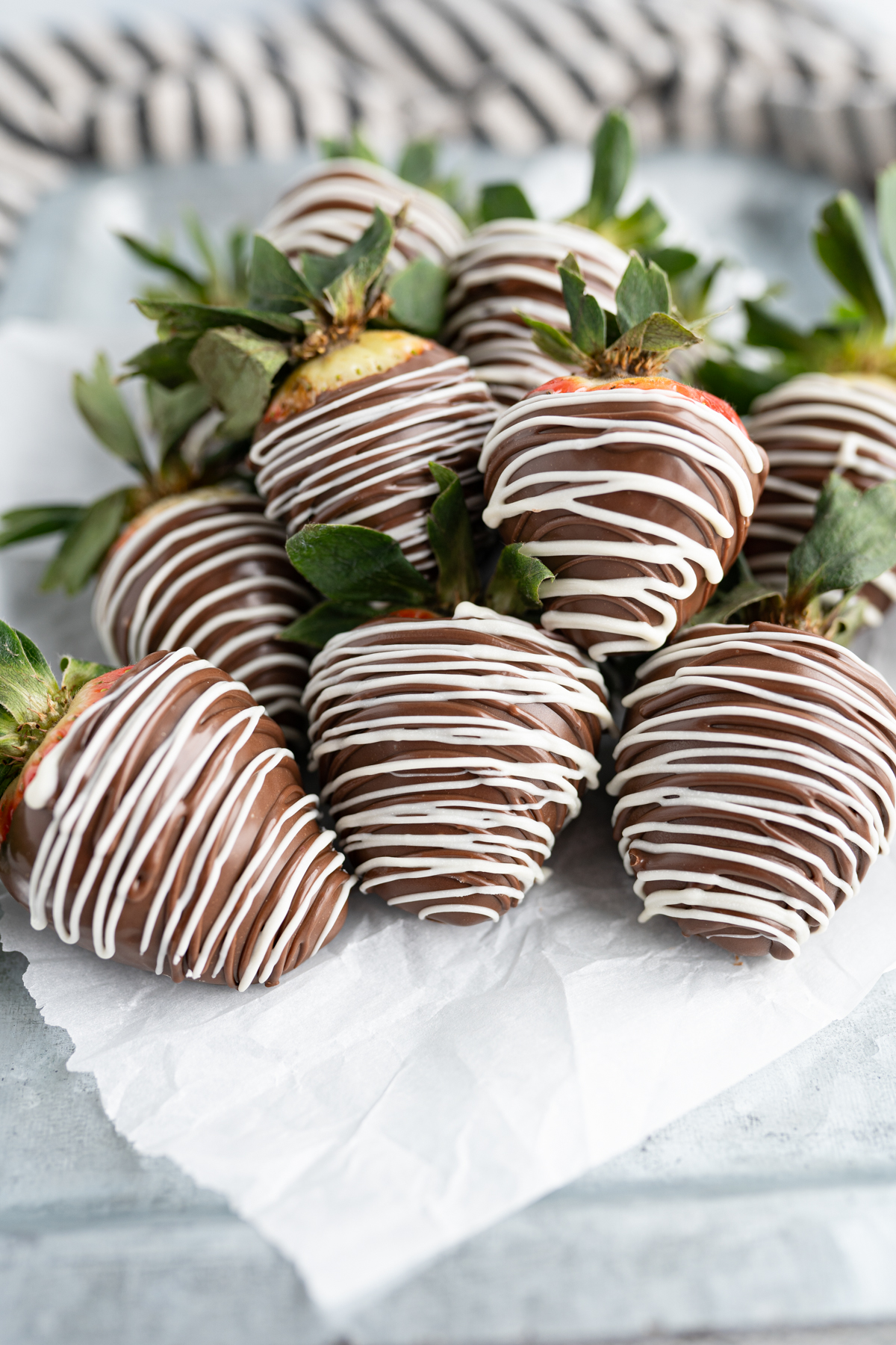 A pile of chocolate strawberries. 