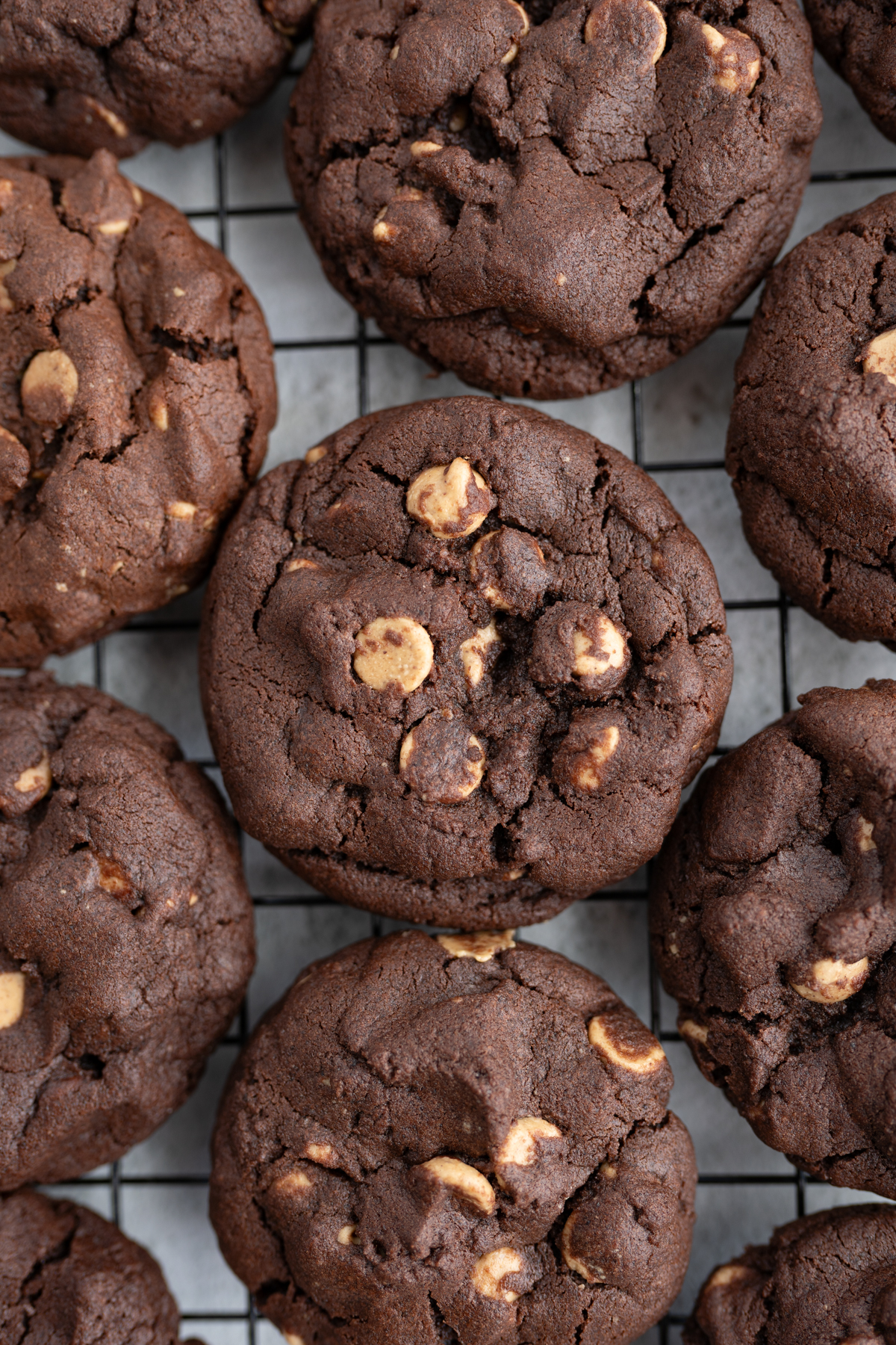 close up of a tray of chocolate peanut butter chip cookies. 