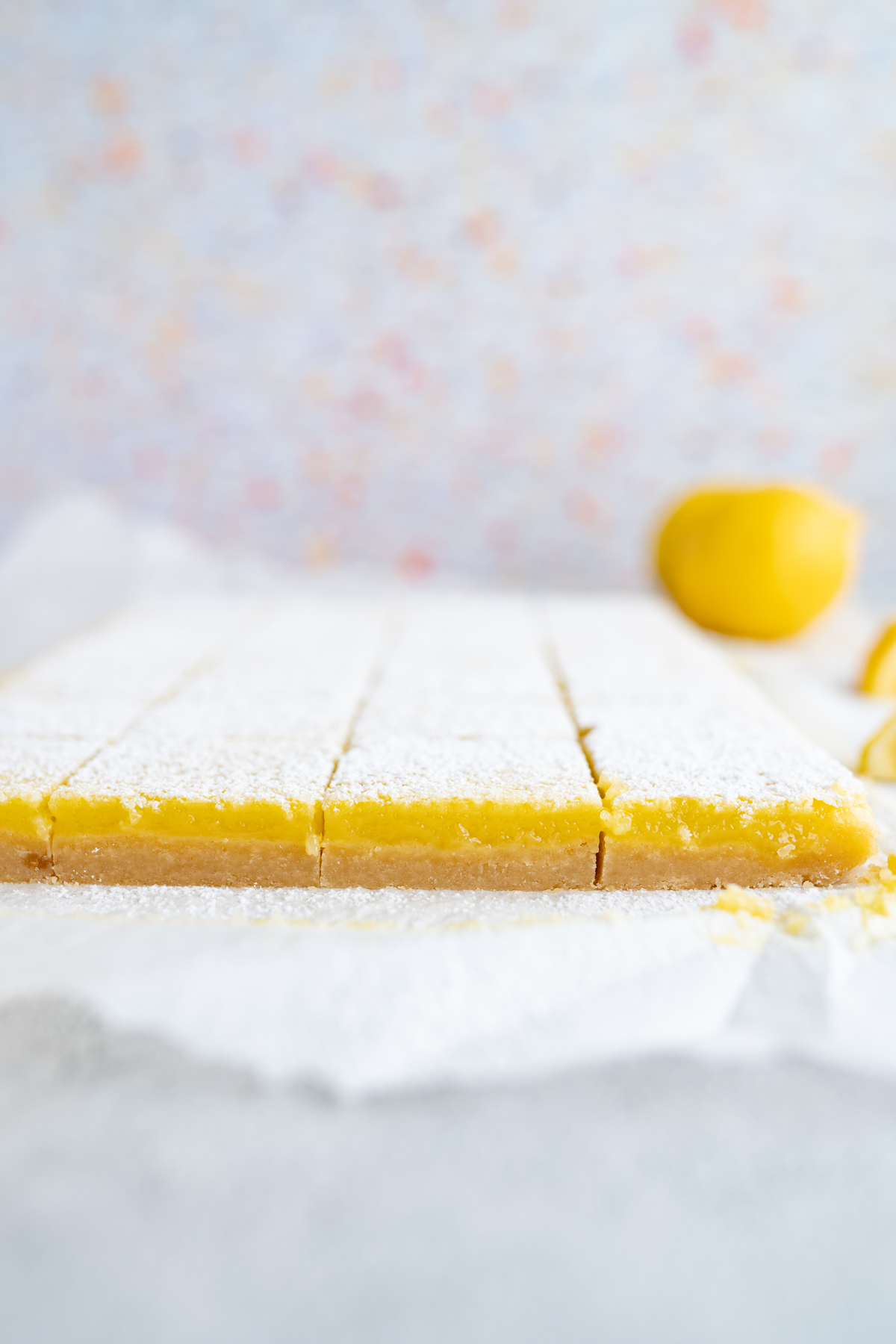 Side view of lemon bars out of the pan. 
