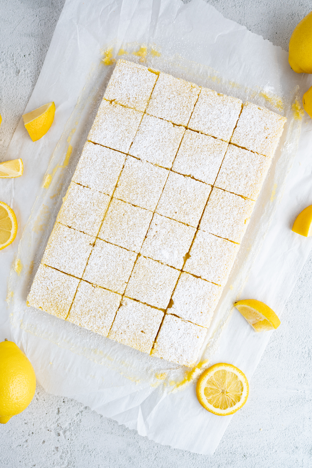 Aerial view of a grid of lemon squares. 