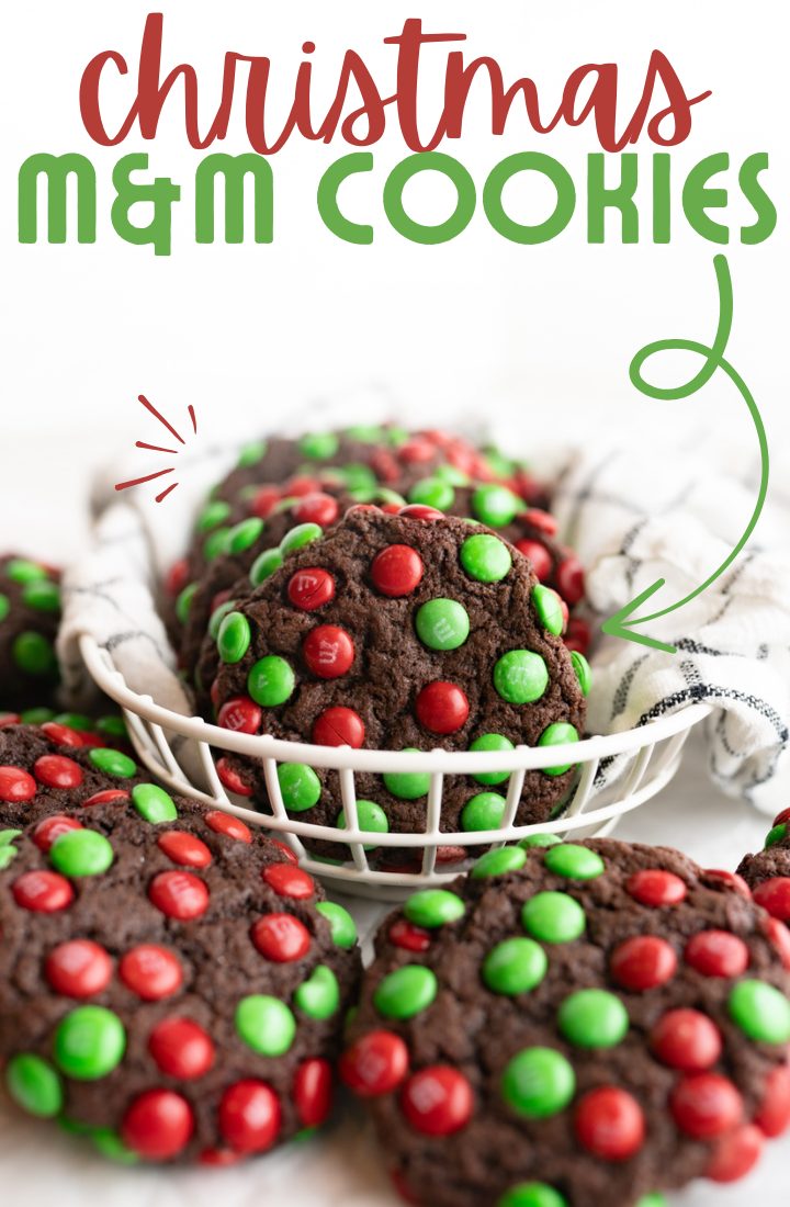 A chocolate m&m cookie made festive to be a christmas cookie.