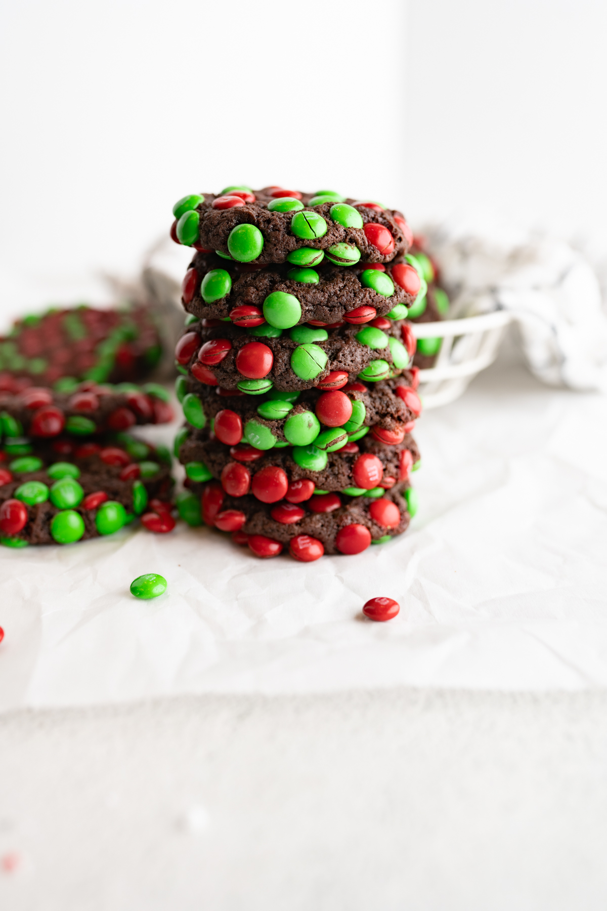 Side view of a tower of christmas m&m cookies. 