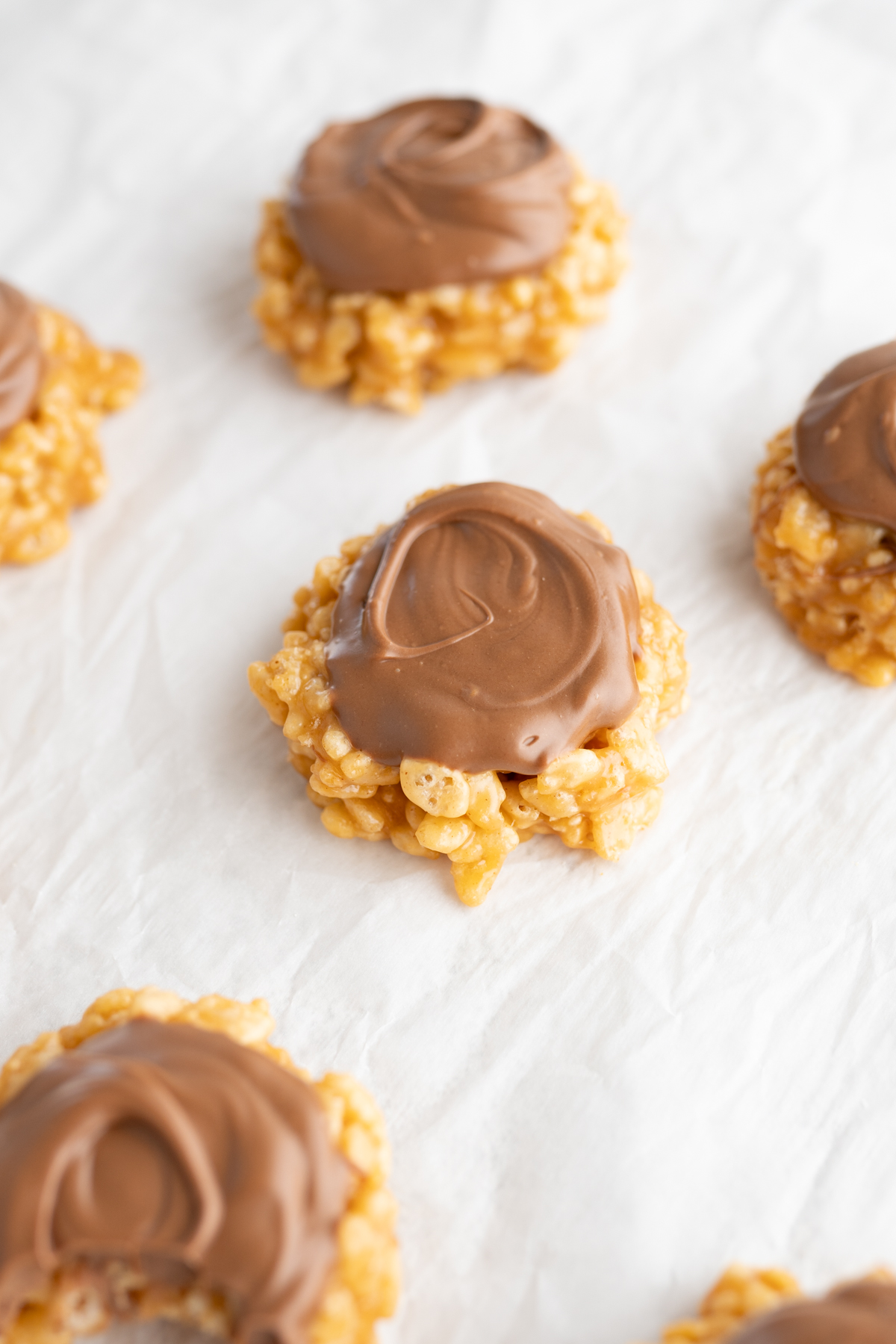 Aerial view of peanut butter rice krispy cookie topped with butterscotch chocolate. 