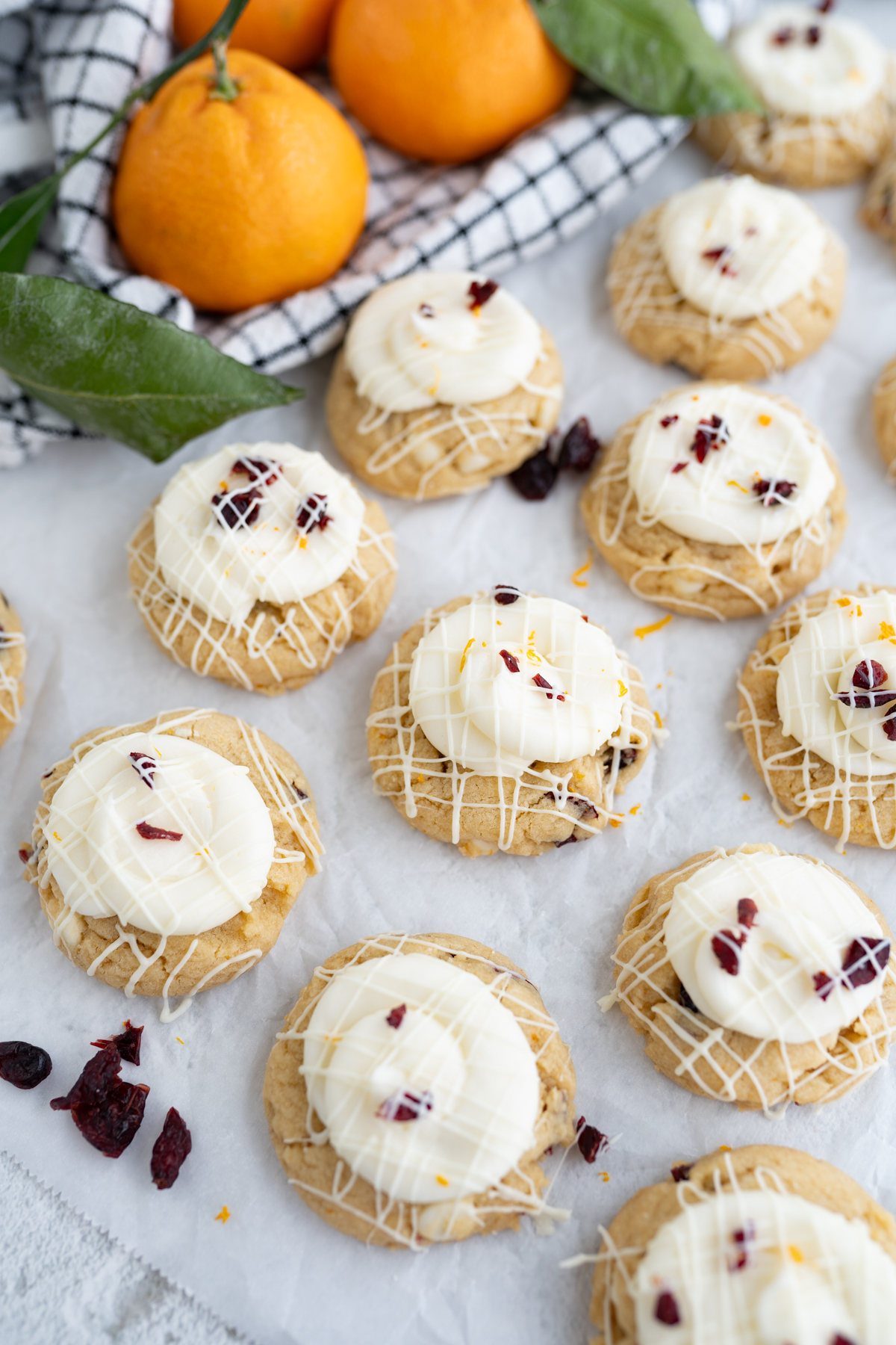 Aerial view of bite sized cranberry bliss cookies on the counter. 