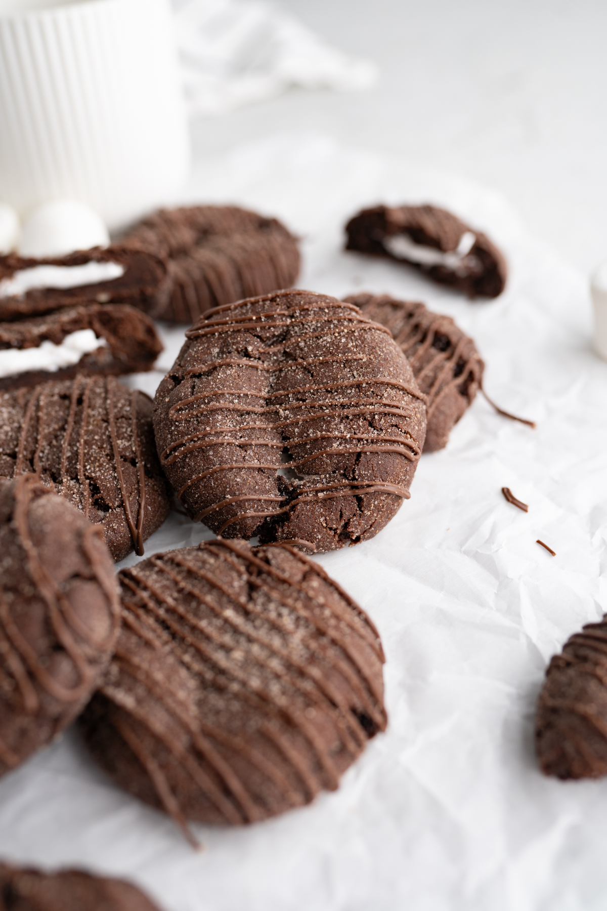Aerial view of a pile of hot chocolate bomb cookies. 