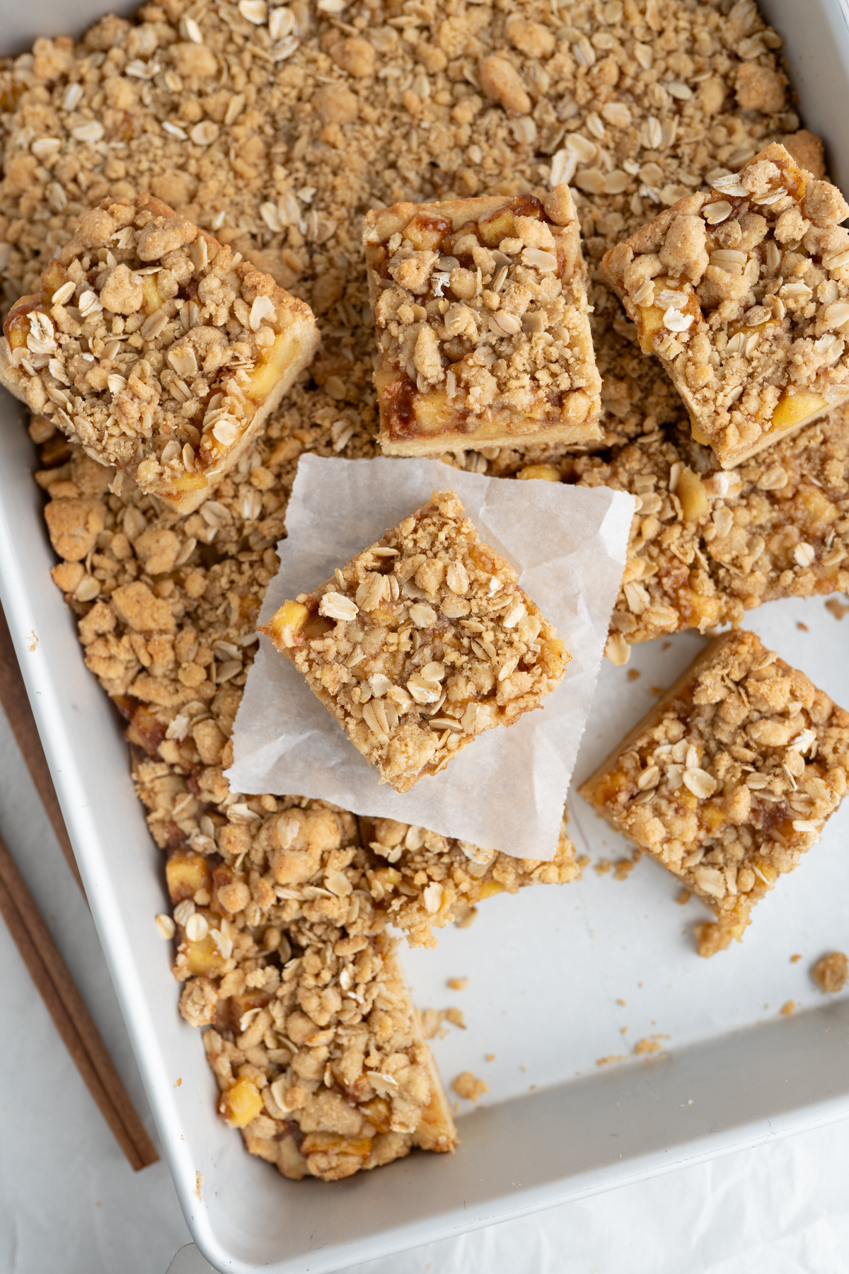 Aerial view of a pan of apple crumb cookie bars. 