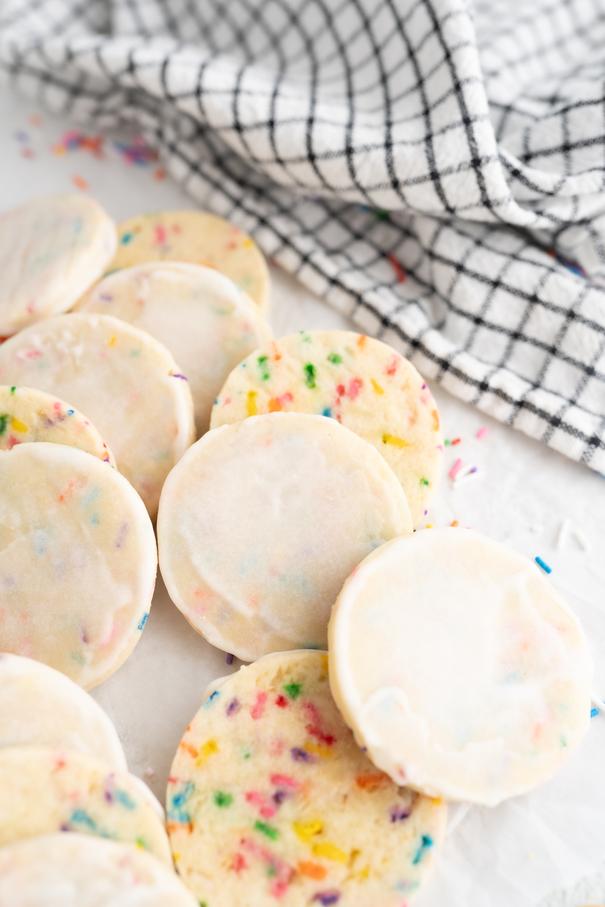 A pile of cake batter meltaway cookies with a light icing. 
