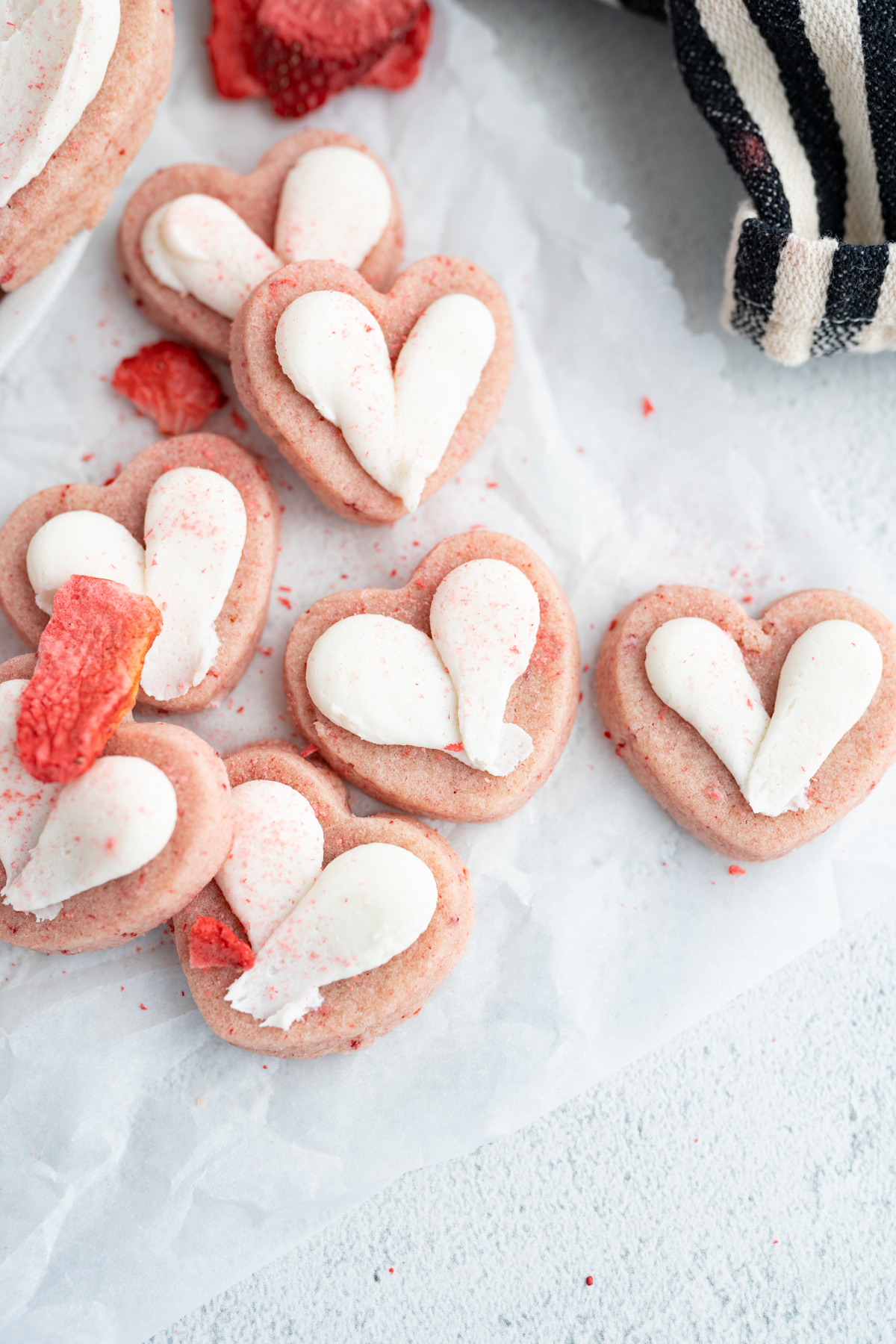 Close up of strawberry cut out sugar cookies. 