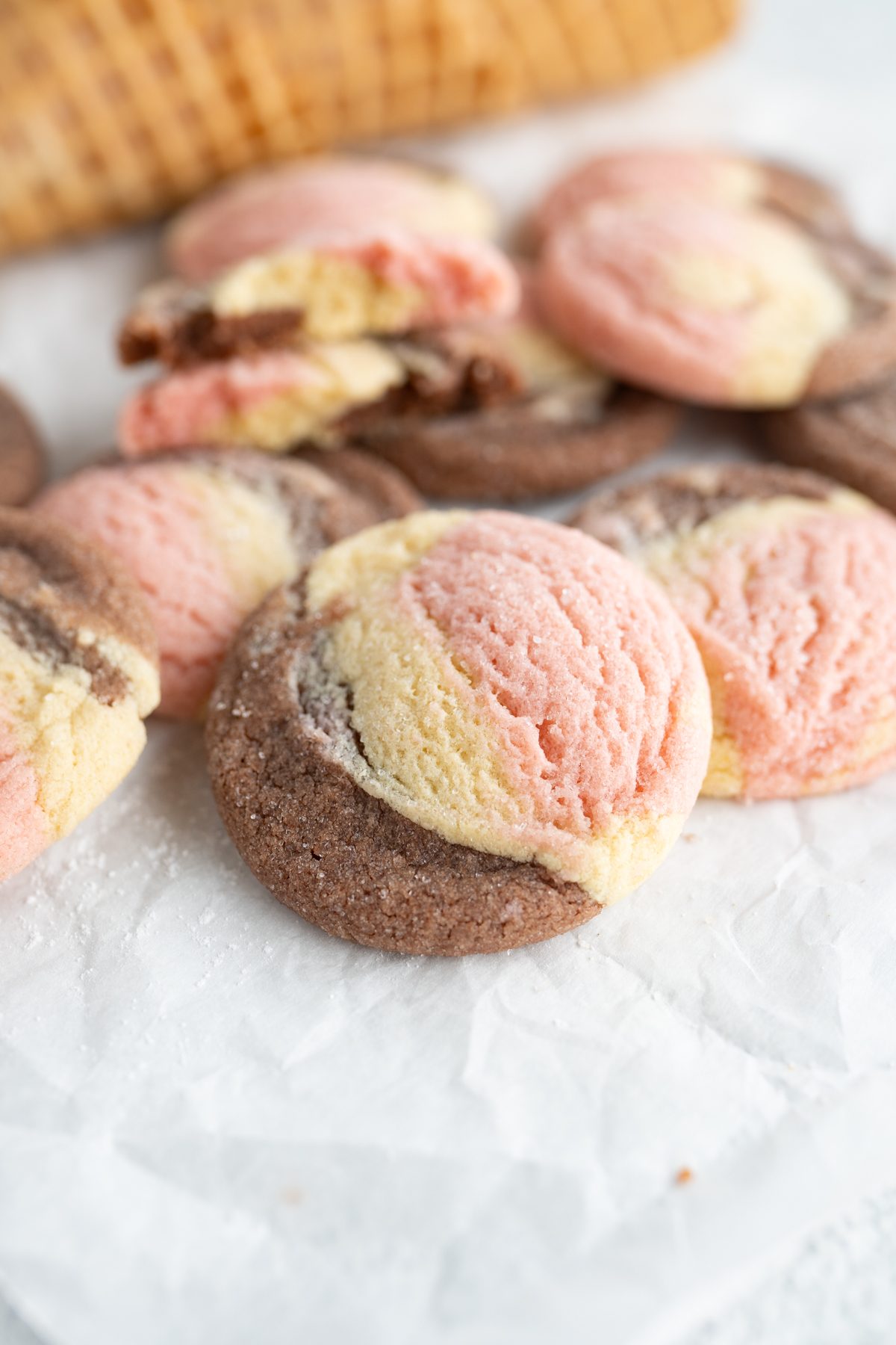 Close up of neapolitan pink, white, and brown cookies. 