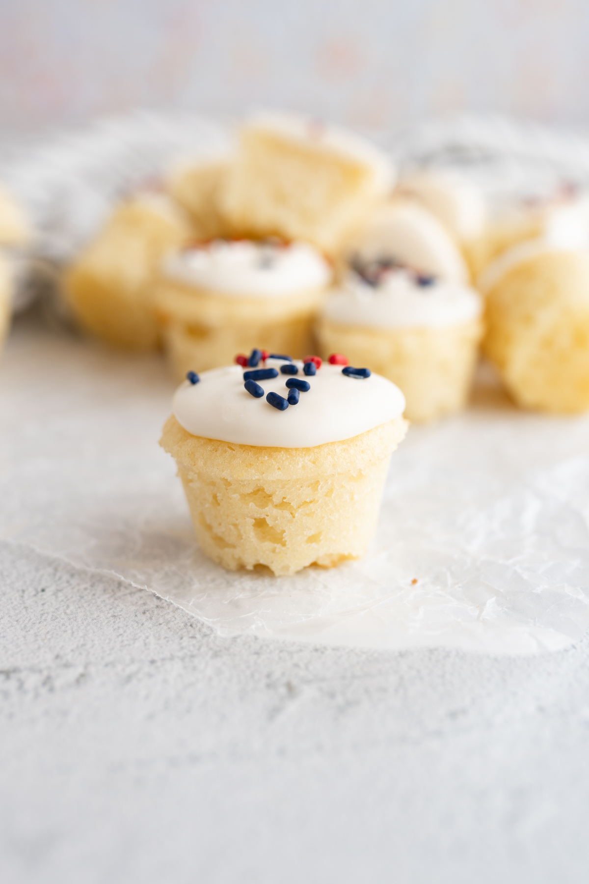 A single patriotic cake bite sitting on the counter. 