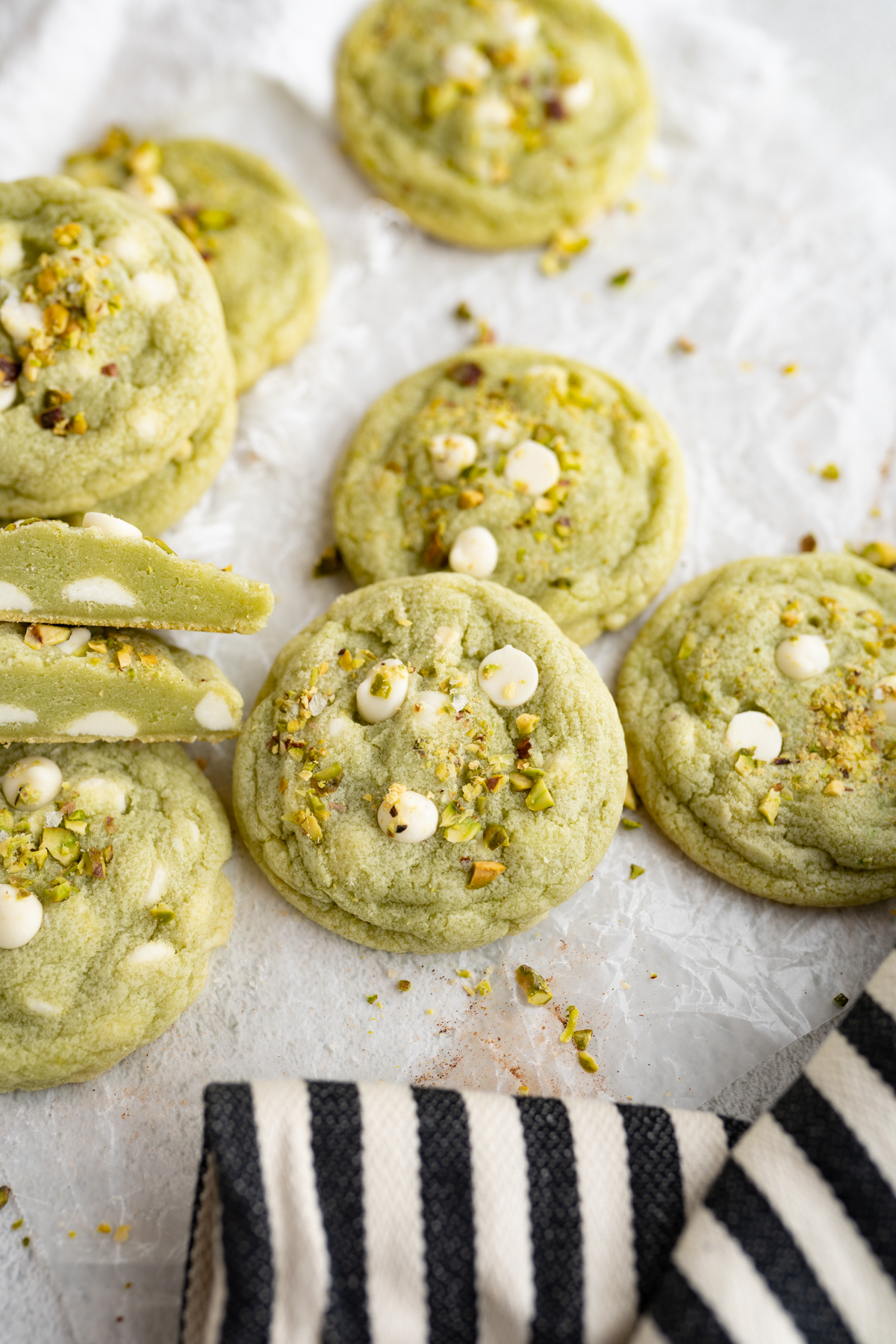 Aerial view of green pistachio cookies on the counter. 