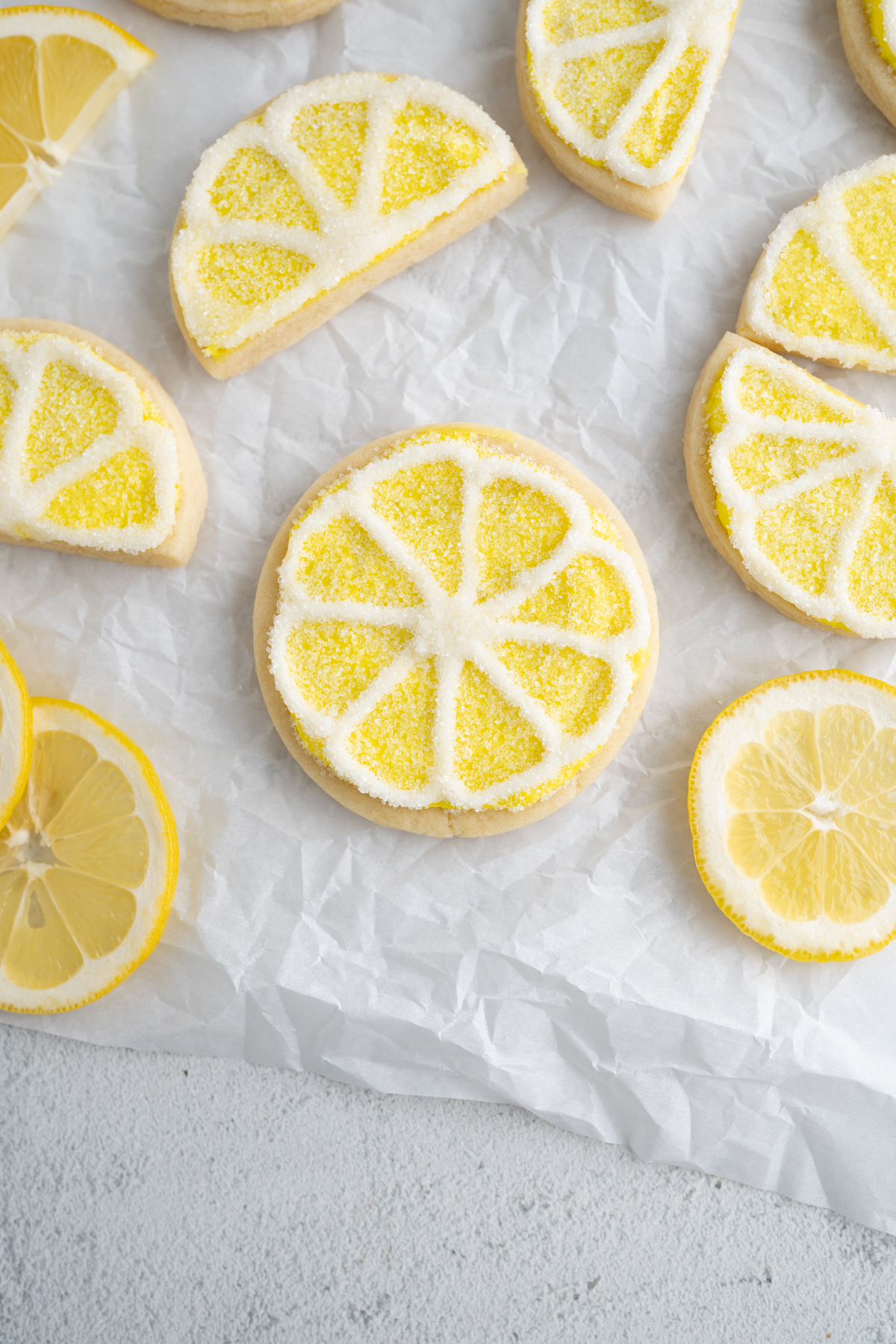Close up of a lemon flavored sugar cookie with lemon frosting. 