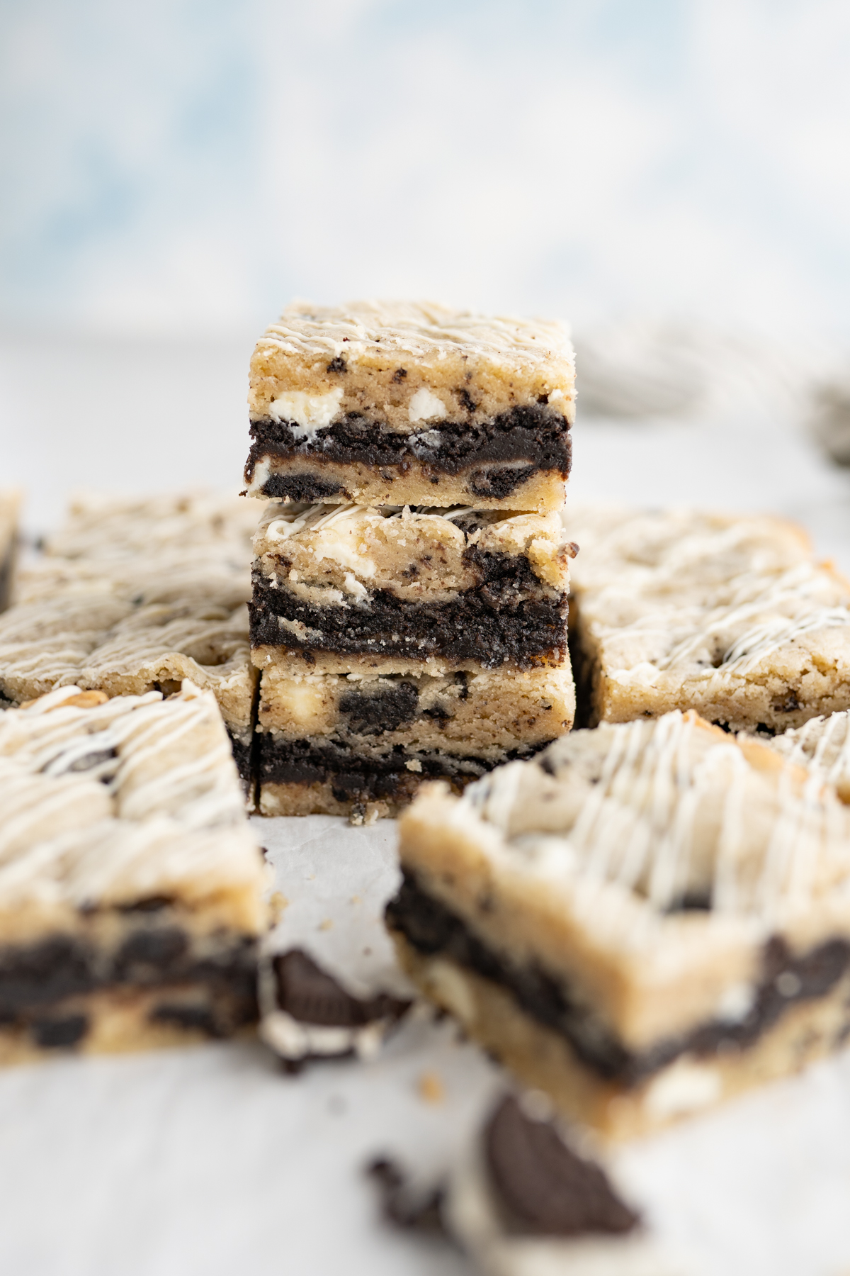 A stack of oreo truffle cookie bars. 